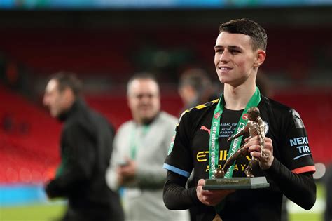 Foden se quita la medalla de subcampeón | marc atkins/getty images. Phil Foden shines in Manchester City's Carabao Cup final ...