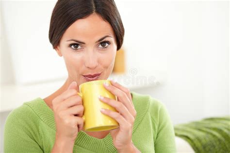 Young Woman Blowing On Hot Coffee Stock Image Image Of Shirt