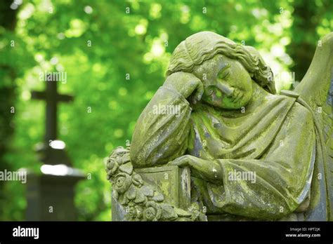 Sad Angel Statue On Old Cemetery Stock Photo Alamy