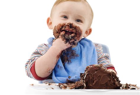 A Messy Baby Eating His Chocolate Cake Odea Marketing Odea
