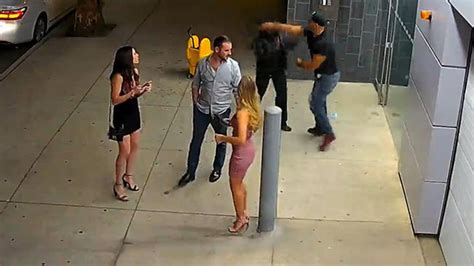 Police Continue Search For Man Caught On Video Punching Female Guard