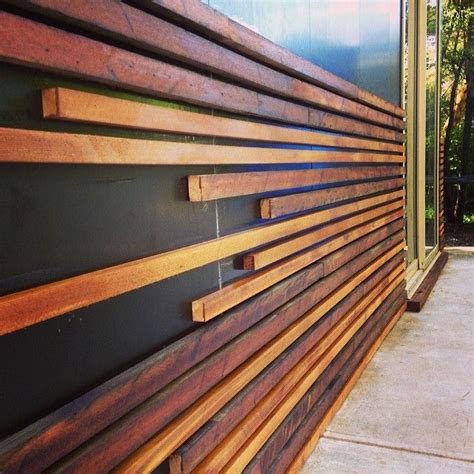 External Cladding Made From 1970s Cedar Wall Panels And Unidentified