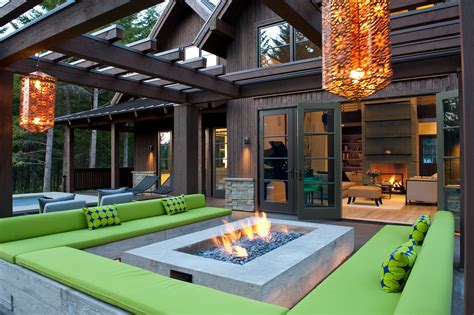 Tumble Creek Residence Features An Outdoor Fire Pit Surrounded By A