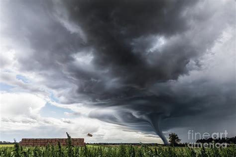 Storm Tornado Or Twister Lifing Hay Bales In Bad Weather Digital Art By