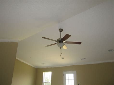 Recessed lighting on vaulted ceilings or sloped ceilings are a refined and classic accent in larger living spaces. Cathedral ceiling fan box | Lighting and Ceiling Fans