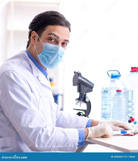 Young Male Chemist Experimenting In Lab Stock Image Image Of
