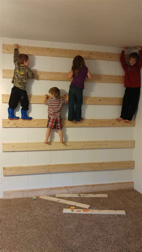 Add climbing holds to your wall. Indoor Climbing Rock wall | Unorthodox DIY Mama | Indoor ...