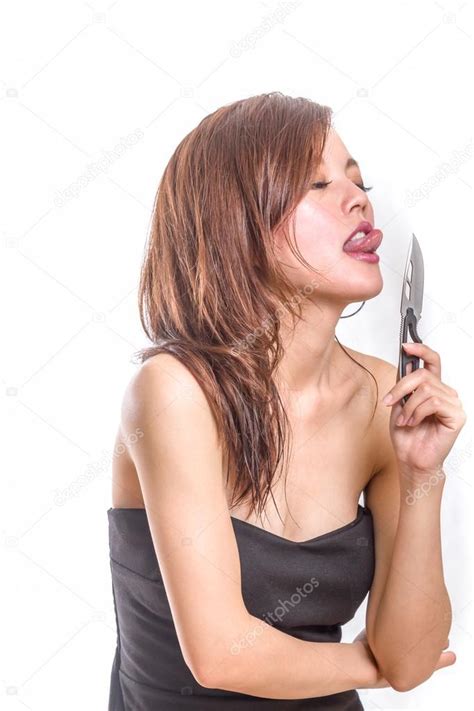 Chinese Woman Licking A Knife Stock Photo By Imagesbykenny