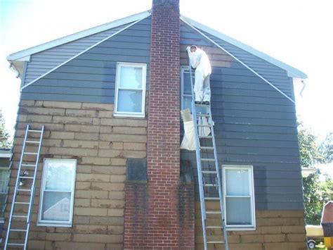 Determine when the shingles were installed on your roof. Photos asbestos siding