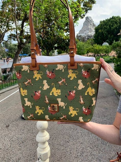 The Lion King Tote Bag Dooney And Bourke Great Placement Of Simba And Napa On The Front Just