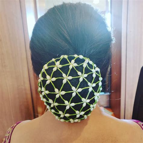 Im In Love With This Simple Low Bun With Flower Net Big