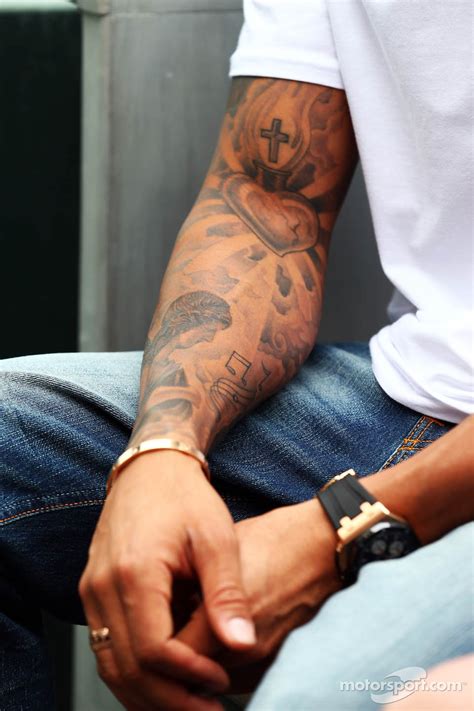 Hamilton devastado por perderse el gp de sakhir por covid. The tattooed arm of Lewis Hamilton, Mercedes AMG F1 ...