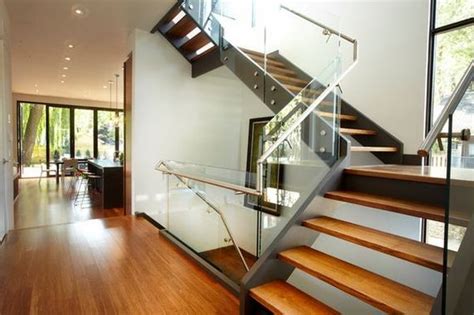 20 Glass Staircase Wall Designs With A Graceful Impact On The Overall