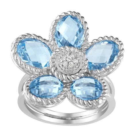 Shop Miadora Sterling Silver Blue Topaz And Diamond Flower Ring Free