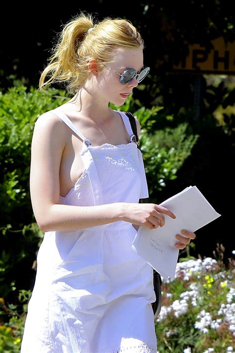 Pale Skinned Stunner Elle Fanning Flashing Her Juicy Nipple In Public