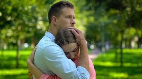 Loving Girlfriend Hugging Boyfriend Looking Into Camera Dating