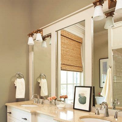 On the framed bathroom mirror, did you you attach it to the wall or the mirror? Don't take down those wide plain mirrors, update them to ...