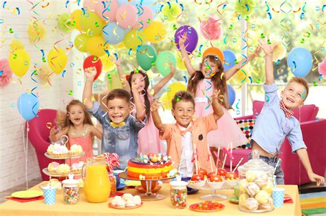 A Little Boy Is Enjoying His Birthday Party With His Great School