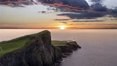 Lighthouse Sunset Crag Horizon Sea 1080p Widescreen