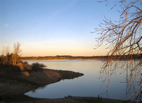 First in passive mode, stimulating the sight, offering a hypnotic panorama, the view over the typical plains of the alentejo which becomes unique with the power of the water bathing it. Montargil - Portugal | Flickr - Photo Sharing!