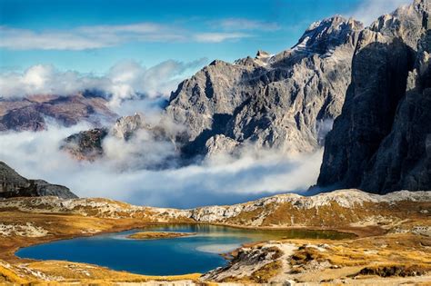 Premium Photo Laghi Del Piani Lakes View And Huge Rocky Mountains In