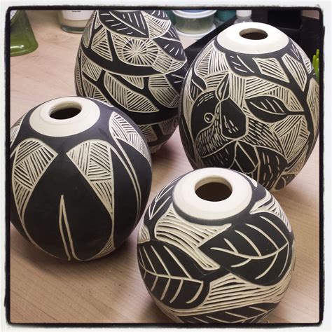 We are glad to be able and share with teachers and artists. Laurie Landry Pottery - Sgraffito carved porcelain orbs ...