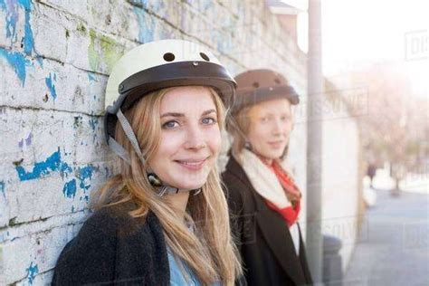 Women Wearing Bicycle Helmets Stock Photo Dissolve