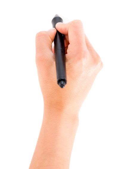 Close Up Of A Hand Holding A Pen And Writing Isolated Over White