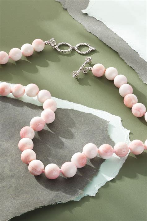 The Beautiful Pink Beads Each Differ Slightly In Their Appearance