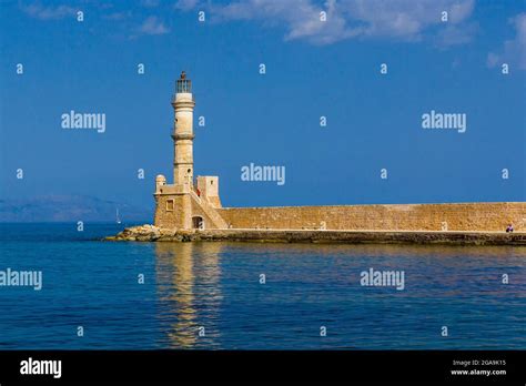 Chania Venetian Old Harbour And Lighthouse Crete Greece Stock Photo