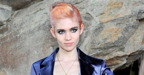 Grimes Has Heard Enough From Guy Producers — Which Is Why She Produces