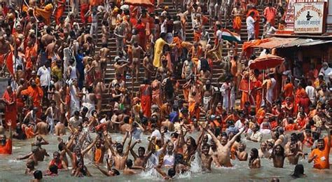 quite possibly the biggest gathering on earth millions of hindus bathe in ganges river to wash