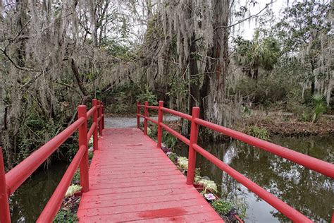 The Red Bridge At Magnolia Plantation Photograph By Katia Kovan Fine