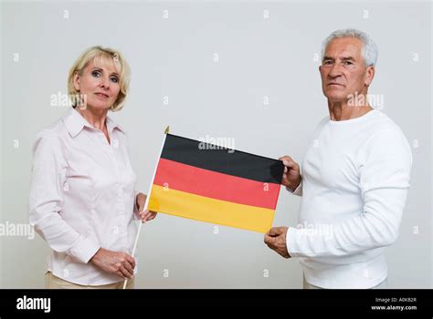 Two Mature People Holding German Flag Stock Photo Alamy