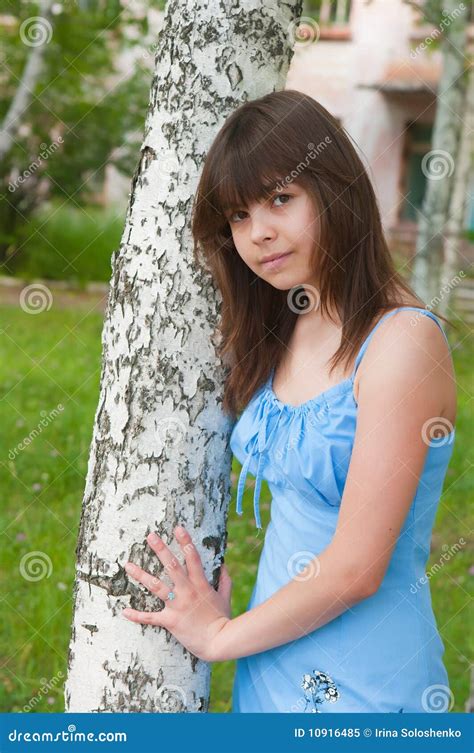 The Girl Stands Near To A Birch Royalty Free Stock Photo Image 10916485