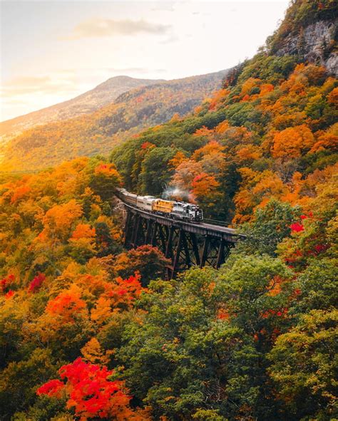 Conway Scenic Railroad Train Through The White Mountains Region Covered