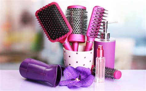 Hair Brushes Hairdryer And Cosmetic Bottles In Beauty Salon A A