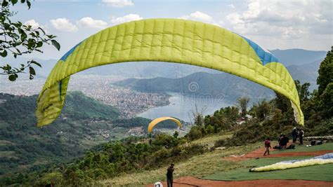 Paragliders Flying Against The Himalayas Pokhara Nepal Editorial