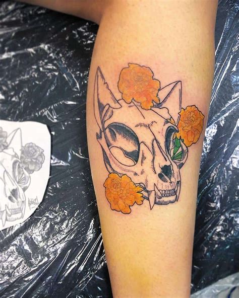 This is a nice twist from the usual sugar skull tattoo design. Top 67+ Best Cat Skull Tattoo Ideas - 2021 Inspiration Guide