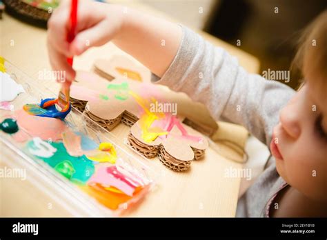 Little Female Baby Painting With Colorful Paints Stock Photo Alamy