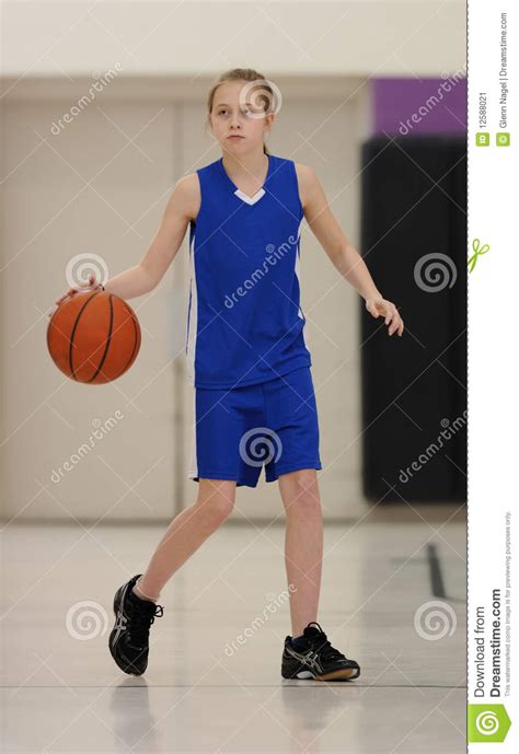 Girl Dribbling Basketball Stock Image Image Of Girl 12588021