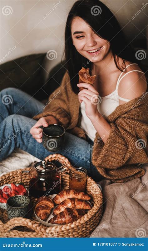 Young Beautiful Smiling Brunette Woman Enjoying Tasty Breakfast In Bed