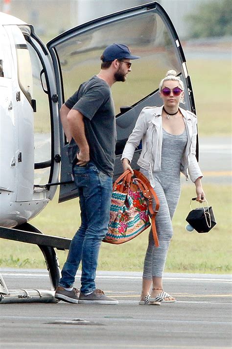 Miley cyrus and liam hemsworth's colorful date night may require sunglasses. Liam Hemsworth and Miley Cyrus in Brisbane, Australia ...