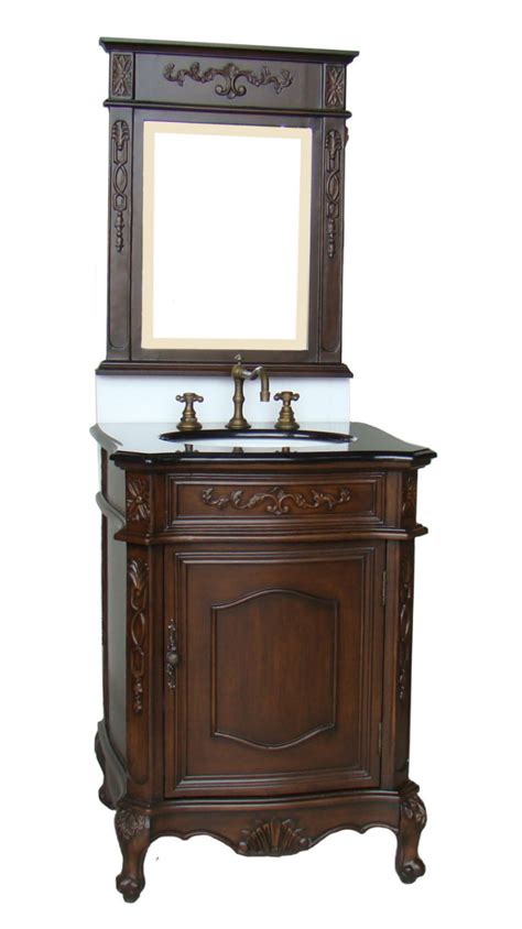 Standing on sleek metal legs, this modern piece makes for an attractive and functional addition to a bathroom. 24-Inch Susan Vanity | Dark Brown Vanity | Black Top Vanity