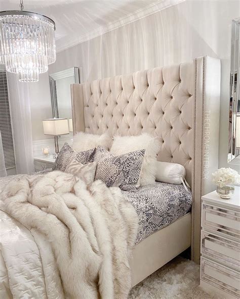glam bedroom with chrome decor accents and faux fur throw via thechromeinterior small room
