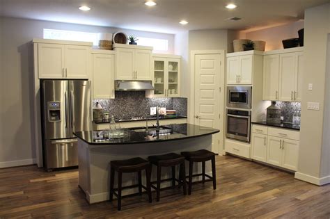 You can decide what fittings you want inside, like adjustable shelves and drawers. Choose flooring that complements cabinet color - Burrows ...
