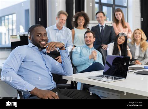 African American Businessman Leading Meeting In Creative Office Boss