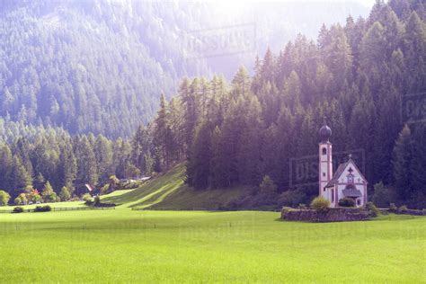 World Famous Saint Johann Church At The Dolomites Alps On The Sunset