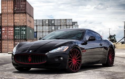 Обои Maserati black GranTurismo with exterior painted lowered Vossen wheels matched and