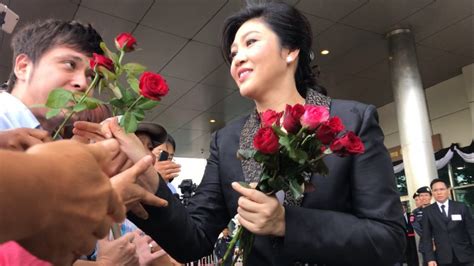 thai ex pm yingluck fled abroad ahead of court date aide